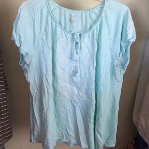Very pretty light blue short sleeve shirt.